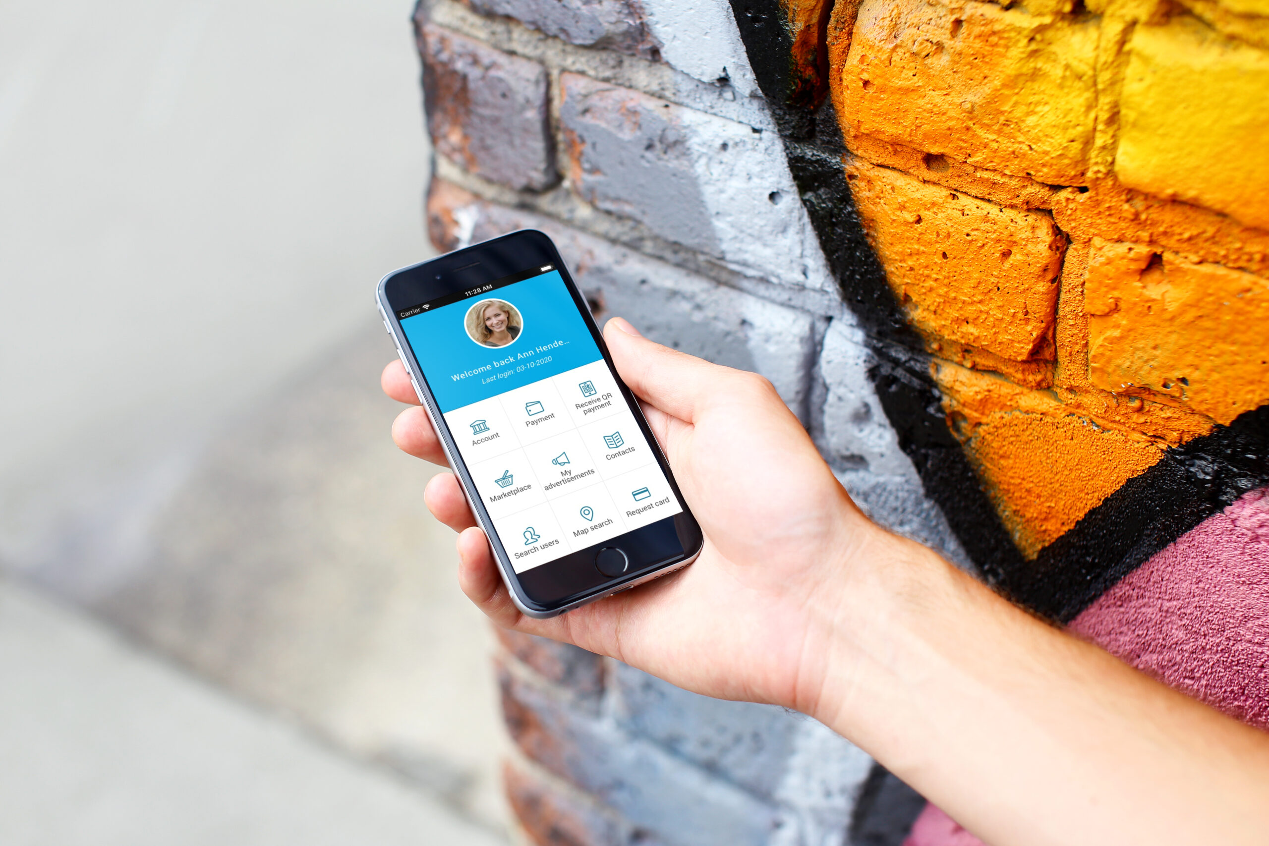 mockuuups-iphone-6s-space-gray-mockup-next-to-the-graffiti-wall